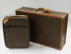 LATE TWENTIETH CENTURY LOUIS VUITTON SUITCASE in the typical logo & floral motif design, having a