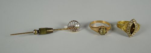 A GOLD & PEARL HAT-PIN & TWO RINGS the pin marked 14k and with two natural pearls, an antique ring