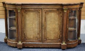 A VICTORIAN BURR WALNUT & MARQUETRY CREDENZA having a two door centre cabinet flanked by reeded