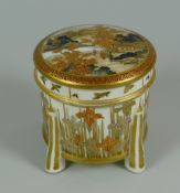 AN EARLY TWENTIETH CENTURY SATSUMA LIDDED BOX having a landscape scene with figures to the lid &