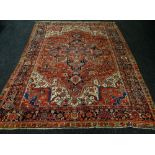 A GOOD VERY LARGE EARLY TWENTIETH CENTURY PERSIAN RUST & COBALT BLUE CARPET, 275 x 385cms