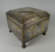 A GOOD ISLAMIC BELIEVED SILVER & YELLOW METAL OVERLAID CASKET profusely decorated with Arabic
