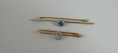 AN UNMARKED BELIEVED 9CT GOLD & SAPPHIRE BAR BROOCH, 3.5gms together with an aquamarine smaller
