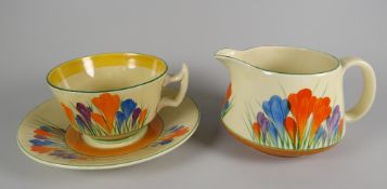 A CLARICE CLIFF 'CROCUS' PATTERN PART-TEA SET for the 'Bizarre' series comprising breakfast cup,