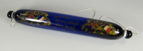 A NINETEENTH CENTURY BRISTOL BLUE GLASS SAILOR'S ROLLING PIN painted with flanking crests