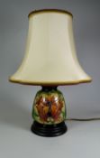 A MODERN MOORCROFT LIMITED EDITION (5/198) TABLE LAMP in the Fireflower pattern by Rachel Bishop