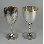 TWO SILVER GOBLETS both with knopped stem, one of plain form and the other with engraved decoration,