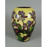 A 2011 MOORCROFT LIMITED EDITION (136) BALUSTER VASE by Emma Bossons, in the Ashwood Medal of Honour