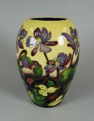 A 2011 MOORCROFT LIMITED EDITION (136) BALUSTER VASE by Emma Bossons, in the Ashwood Medal of Honour