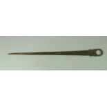 A GEORGE III IRISH SILVER MEAT SKEWER having a ring handle and repeat patterned engraving with