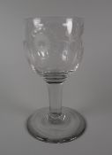 AN MID-EIGHTEENTH CENTURY GLASS GOBLET having an ovoid bowl etched with Jacobite emblems of rose,