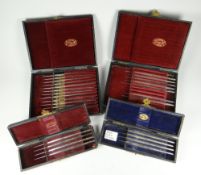 FOUR CASED SETS OF OPTHALMIC PRECISION INSTRUMENTS including set of four Pooley's iridotamy knives