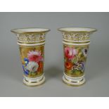 A PAIR OF NINETEENTH CENTURY SPILL-HOLDERS with flared rims and inverted foot, bead-work to lower