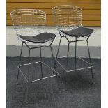 A PAIR OF CHROME WIRE WORK HIGH STOOLS in the style of Harry Bertoia, being of curved & shaped