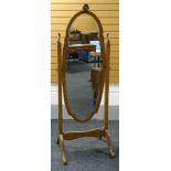 A BURR WALNUT CHEVAL MIRROR of oval shaped form within a cabriole acanthus carved frame, 175cms
