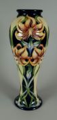 A 2009 MOORCROFT LIMITED EDITION (12/76) TALL BALUSTER VASE by Rachel Bishop, in the Sweet Lily