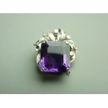AN AMETHYST PENDANT having a strong purple emerald cut faceted stone, approximately 14.8 x 13mms and