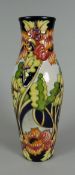 A 2006 MOORCROFT LIMITED EDITION (75/150) SLENDER VASE in the Woodland Path pattern by Kerry