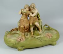 ROYAL DUX FIGURAL BASIN in typical blush glaze & with two robed companions one consoling the other