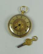 AN 18k ENGRAVED YELLOW GOLD ANTIQUE FOB WATCH WITH KEY WIND bearing Roman numerals to the floral