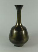 AN UNUSUAL LUSTROUS METALLIC VASE believed bronze Chinese, with narrow neck, no markings, 21.5cms
