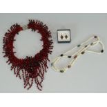 A STRING OF FRESHWATER PEARLS & RED GLASS NECKLACE & EARRINGS