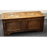 A LATE EIGHTEENTH / EARLY NINETEENTH CENTURY OAK BLANKET CHEST of plain form with inverted panels,