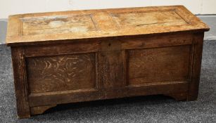 A LATE EIGHTEENTH / EARLY NINETEENTH CENTURY OAK BLANKET CHEST of plain form with inverted panels,