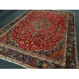 PERSIAN CARPET large red ground, Persian Mashad, 272 x 365cms