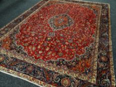 PERSIAN CARPET large red ground, Persian Mashad, 272 x 365cms