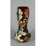 A YEAR 2000 MOORCROFT LIMITED EDITION (6/92) SMALL GOURD SHAPED VASE in the Masquerade pattern,