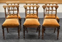 A SET OF SIX VICTORIAN GOTHIC REVIVAL DINING CHAIRS with cushioned drop-in seats