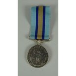 A ROYAL OBSERVER CORPS MEDAL to J W LAWRENCE