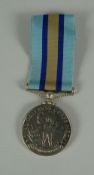 A ROYAL OBSERVER CORPS MEDAL to J W LAWRENCE