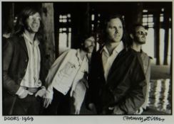 HENRY DILTZ black & white still photograph - four members of the rock band The Doors, beneath a pier