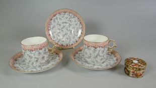 A PAIR OF ROYAL CHINA WORKS WORCESTER CUP & SAUCERS and spare saucer together with a Royal Crown