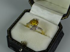 AN 18CT YELLOW GOLD SET DIAMOND & YELLOW STONE RING, 4.1gms