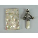 A SILVER & MOTHER-OF-PEARL BABY'S RATTLE incorporating teether and whistle together with a mother-