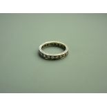 AN EIGHTEEN CARAT WHITE GOLD DIAMOND SET FULL ETERNITY RING, approximately twenty two Swiss cut