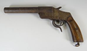 A WWI PERIOD HEBEL GERMAN FLAIR GUN having a wooden handle, serial number 16713, barrel to trigger
