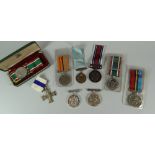 VARIOUS UNNAMED MEDALS including Military Cross, cased Women's Voluntary Service medal, Long Service