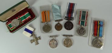 VARIOUS UNNAMED MEDALS including Military Cross, cased Women's Voluntary Service medal, Long Service