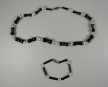 A BLACK, PINK & WHITE CORAL NECKLACE & MATCHING BRACELET necklace size 42cms