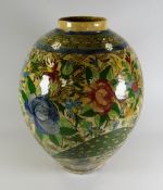 A QAJAR-STYLE PAINTED POTTERY VASE of bulbous form & decorated with a floral garden design with