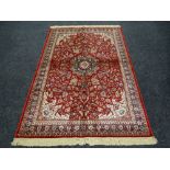 KASHMIR RUG red ground medallion design, 156 x 236cms