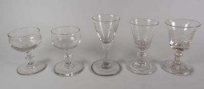 VARIOUS ANTIQUE DRINKING GLASSES including a pair of Georgian knopped port glasses, circa 1800 a