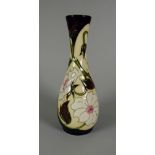 A 2007 RARE MOORCROFT NARROW NECK VASE in the Yorkshire pattern, (no.53), by Sian Leeper, 21cms