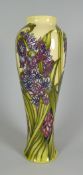 A 2012 MOORCROFT LIMITED EDITION NARROW NECKED BALUSTER VASE in the Hyacinth pattern from the Legacy