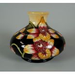 A 2004 MOORCROFT LIMITED EDITION (5/35) NARROW NECK SQUAT VASE in the Orchid pattern from The