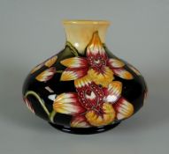 A 2004 MOORCROFT LIMITED EDITION (5/35) NARROW NECK SQUAT VASE in the Orchid pattern from The